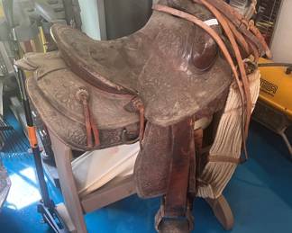Saddle and bosal with leather reins