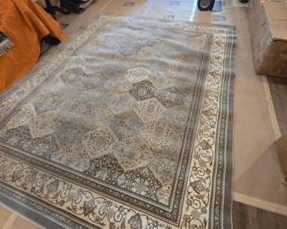 Newer, lightly used rug 9x12