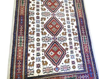 6x9 hand made wool rug.Other unique hand made wool rugs in the auction