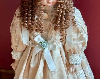 Porcelain Doll if Victorian Style Dress and Bonnet.