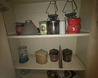 This group of items includes candles & candle holders, along with some metal shelves