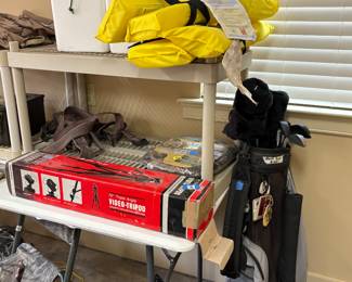 Garage - Dunlop irons & various woods with golf bag - sells as set