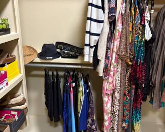 Master bedroom closet - women's clothing, hats, belts