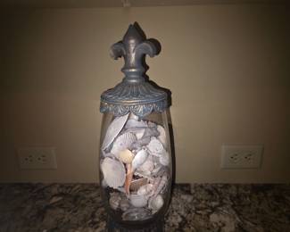 Urn with sea shells