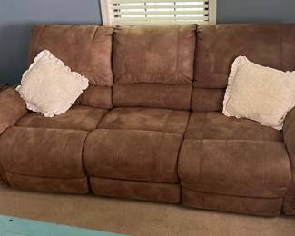 Suede Reclining Sofa. Clean and barely used. Comes from a clean home.