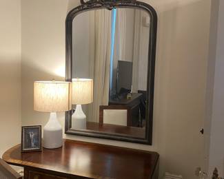 Regency style writing table on castor wheels with drop-down leafs. Large vintage mirror.
