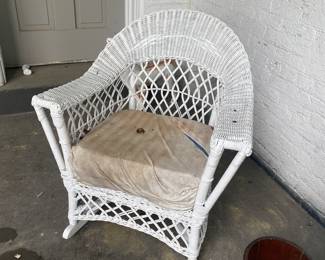 Antique wicker rocking chair.