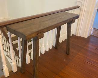 RH sawhorse console table.