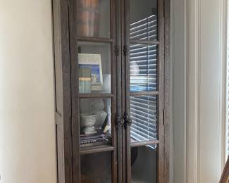 RH tall book case with glass doors and casement hardware.
