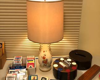 Vintage lamp, playing cards, poker chip caddy, cribbage board