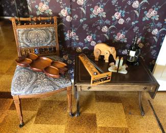 Eastlake chair, Shoot the Moon game, onyx bookends, wooden elephant