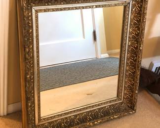 Mirror in exquisite antique gilt frame (22” x 24” x 3” deep)