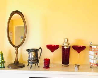 Zsolnay Eosin tower, wooden mirror on stand, ornate Reed & Barton creamer, ruby glass cocktail shaker & goblets, sports theme cocktail shaker