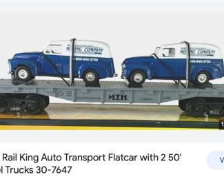 Box 9. MTH flatcar with Moving vans