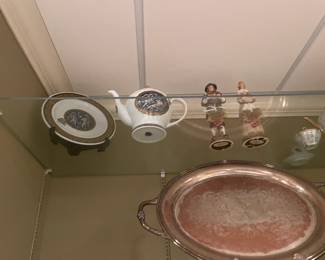 . . . figures and another teapot