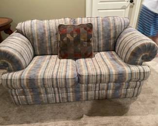 . . . nice striped upholstered love seat