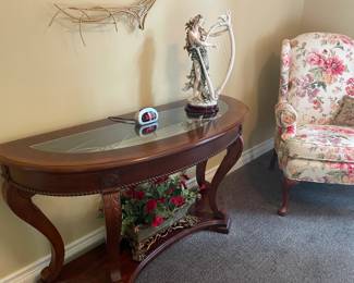 . . . a third wall table and accent sculpture
