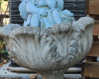 2 separate pieces of yard art.