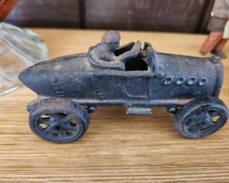 Vintage cast iron toy car A.C Willians Boat Tail Racer.