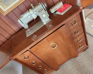 MCM Sewing Cabinet with Pull Out Chair and a Pfaff Sewing Machine. Nice condition.