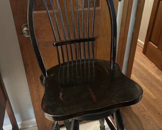 THREE BLACK SWIVEL BAR STOOLS