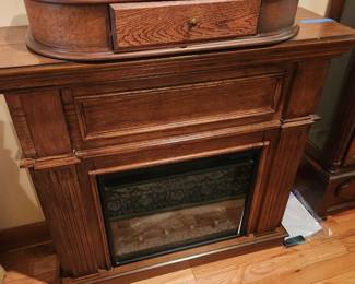 Fireplace w/ Mantel.