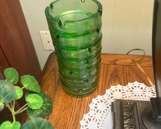 Stack of green ashtrays