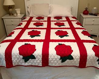 Machine quilted quilt
Queen size Bed
White night stands