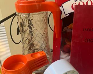 Tang pitcher
Orange Tupperware measuring cups
Timer