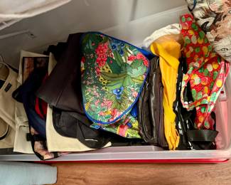 Lots of travel bags and totes