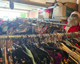 Racks of vintage and designer clothing all sizes