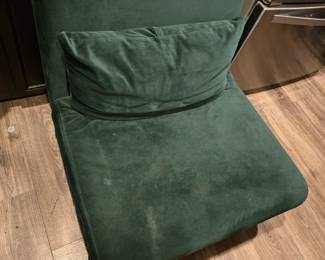 Green chaise lounge opens up to full twin lounge