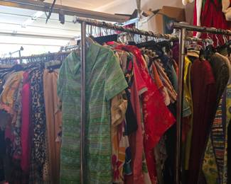 Racks of vintage and designer clothing all sizes