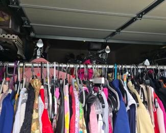 Racks of vintage and designer clothing all sizes