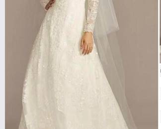 Olga Cassini wedding gown . Never altered, never worn. Original tags still atrached