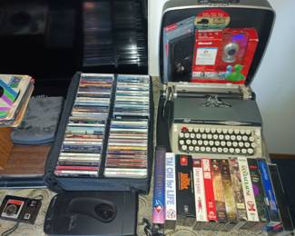 CDs, VHS, typewriter
