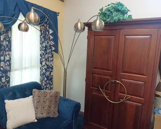 Pedestal lamp and armoire
