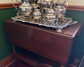 Silver-plated tea set and antique tea cart in excellent condition