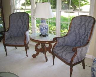 Upholstered chairs, marble top table