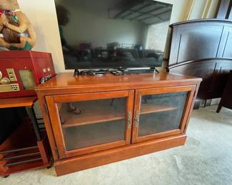 LG television, Blu-Ray player, media cabinet