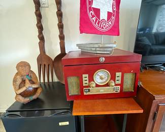 Dorm-sized refrigerator, small end table