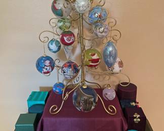 Huge selection of amazing Li Bien hand-painted glass ornaments. (The tree stand is not for sale.)