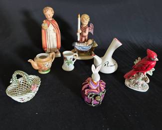Assorted figurines including Goebel Hummel's Holy Child and Watchful Angel (Mid Century)