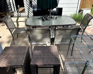 More patio furniture - glass top table and chairs.
