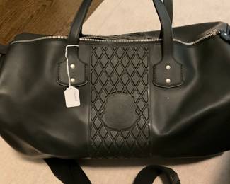 BLACK RUBBER GHURKA BAG RETAILS FOR $1345