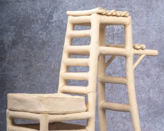https://www.liveauctioneers.com/item/207340898_frank-fleming-ceramic-chair-bench-sculpture