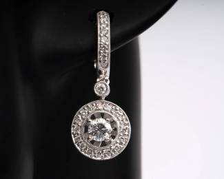 https://www.liveauctioneers.com/item/207402851_parade-18k-white-gold-diamond-drop-earrings-with-brilliant-cut-halo-and-hoop-accents