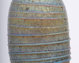 https://www.liveauctioneers.com/item/207340874_tiffany-lavacypriote-art-glass-vase