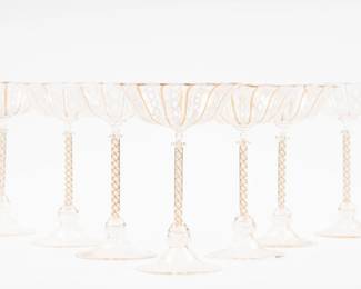 https://www.liveauctioneers.com/item/207340791_set-of-7-venetian-murano-latticino-stemware-glasses-w-gold-twist-stem