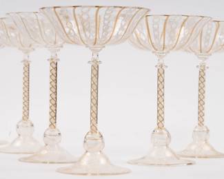 https://www.liveauctioneers.com/item/207340793_set-of-7-venetian-murano-latticino-stemware-glasses-w-gold-twist-stem